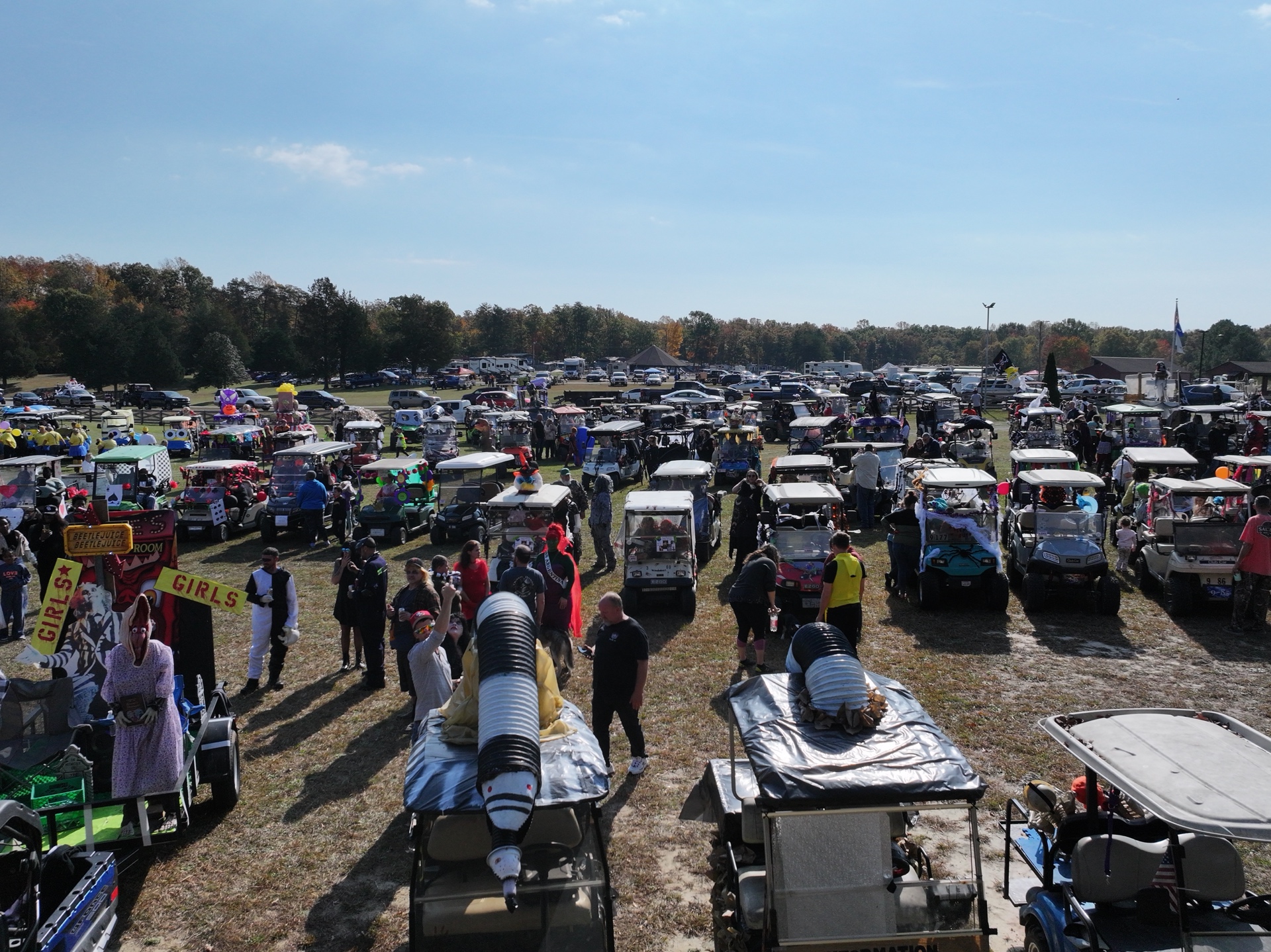 Aerial view of decorated golf carts at Halloween parade